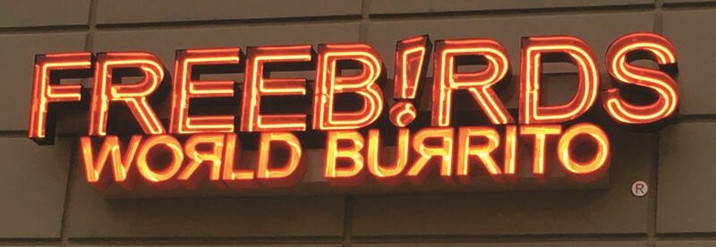 Exposed Neon Channel Letter Sign installed for Free Birds Burritos in Texas